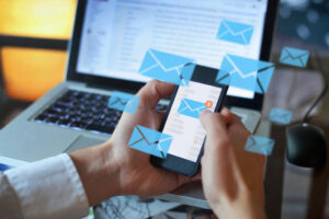 email marketing concept, person reading e-mail on smartphone, receive new message